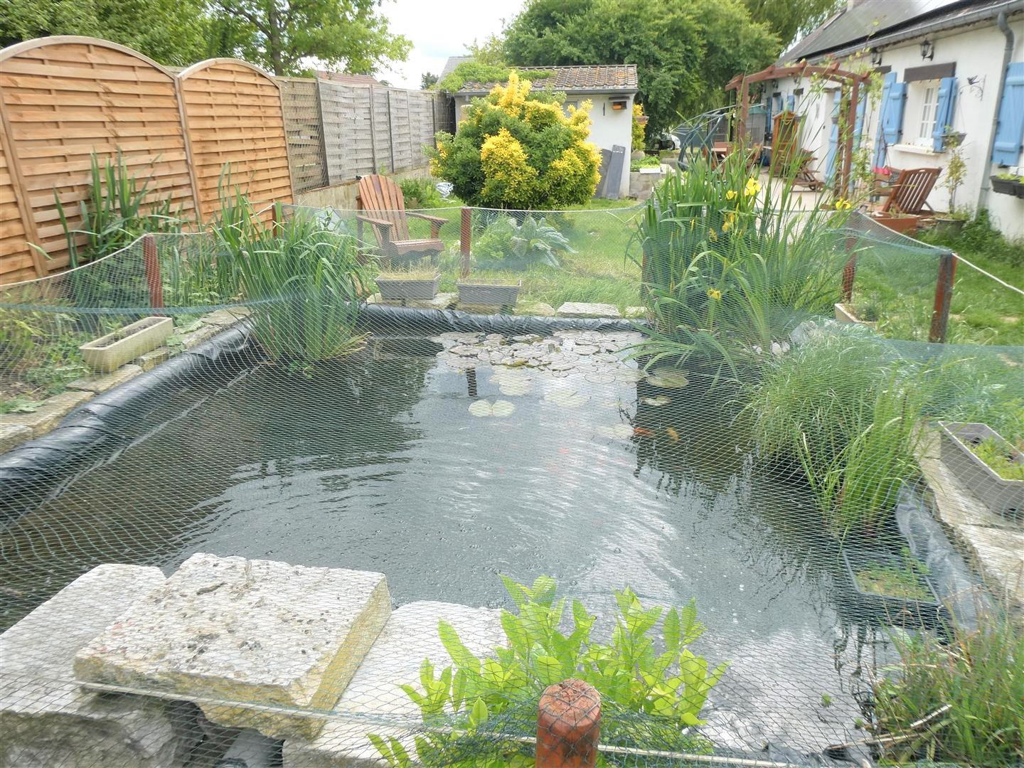 Charmante longère de plain-pied avec dépendancesMARCILLY-LA-CAMPAGNE