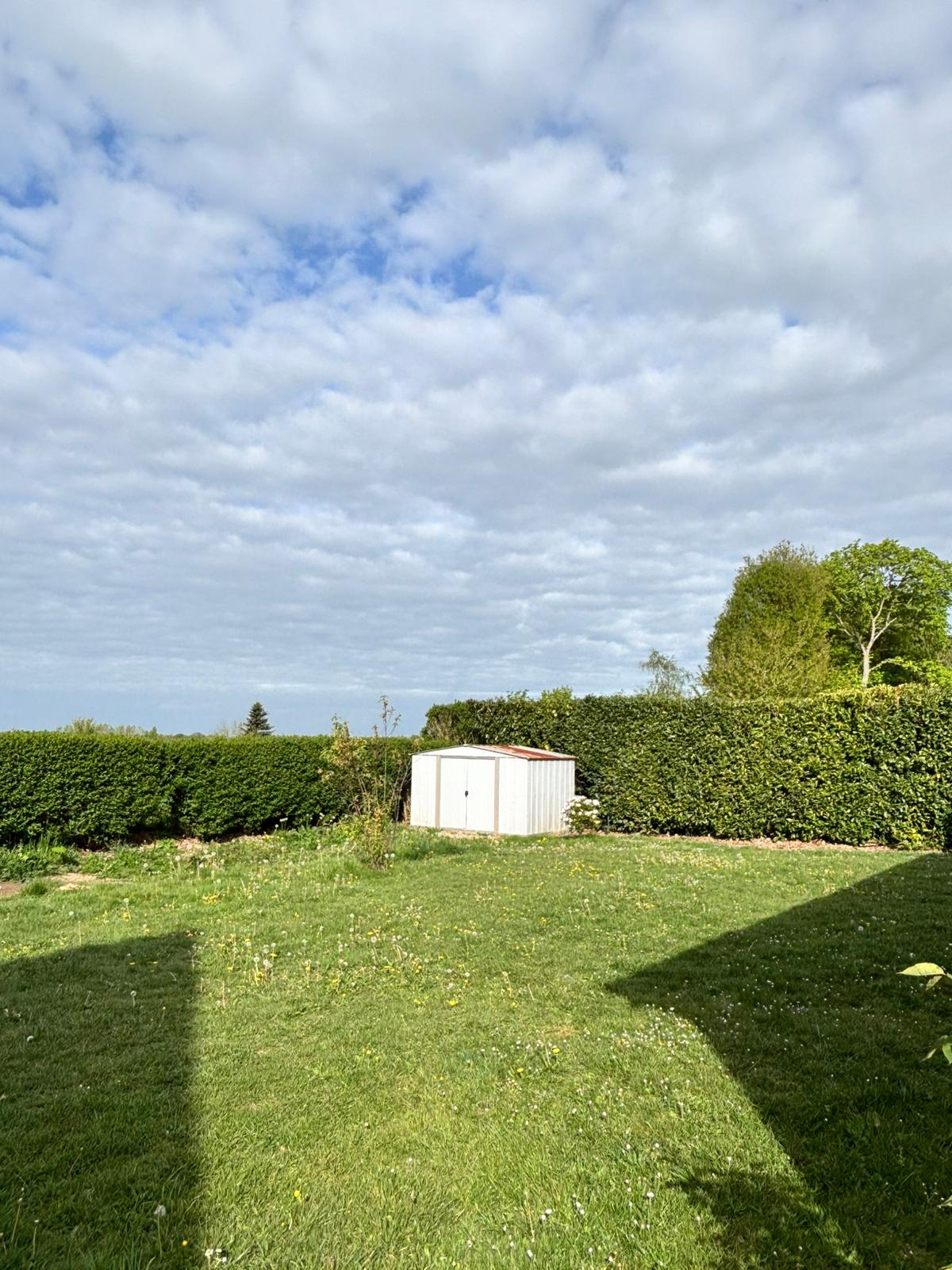 Maison traditionnelle de plain-pied, alliant confort et fonctionnalité